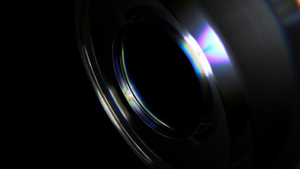 Light diffraction creating vibrant rainbow colors on a glass surface, with a dark background intensifying the rich hues and adding depth to the mesmerizing display of optics