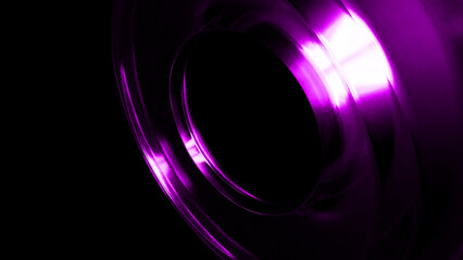 Light painting photography creates a vibrant, swirling purple vortex against a dark backdrop, forming an abstract composition with dynamic lines and glowing highlights