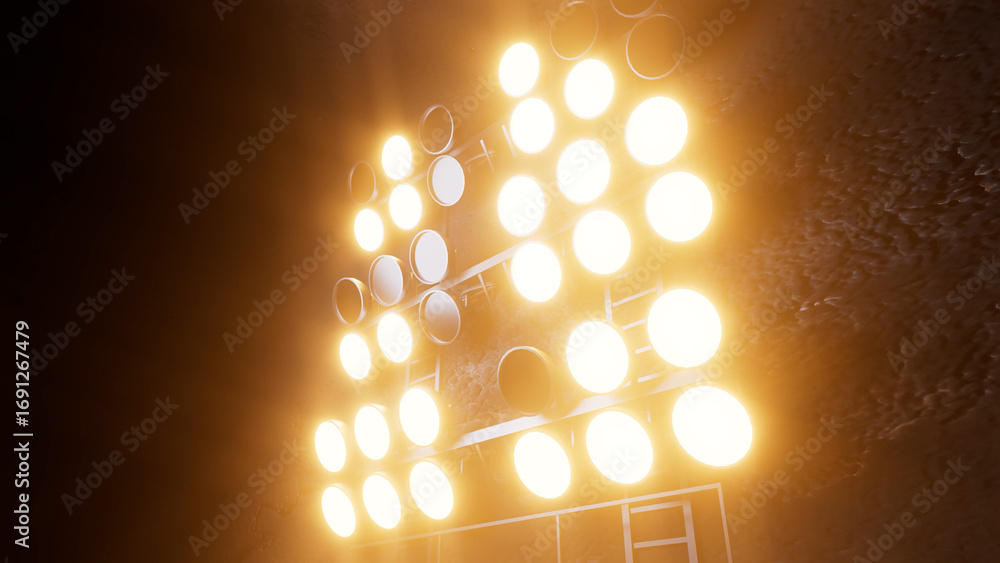 Poster powerful stadium lights are casting a warm, inviting glow, illuminating the field below and creating