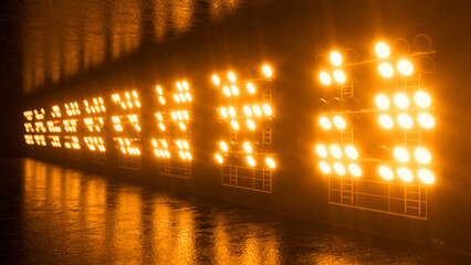 Creating a captivating wall of orange spotlights reflecting on a wet floor, illuminating a dark...