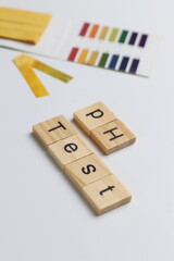 pH test strips in a white background with copy space