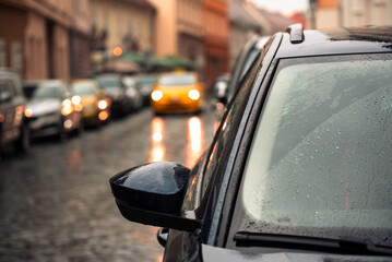 Cars on old city street