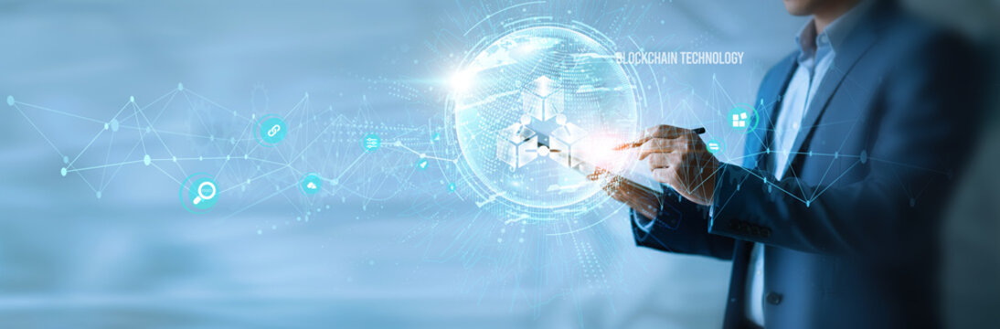 Businessman using tab blockchain technology icon with global network. Decentralized finance, cryptocurrency security, smart contracts, distributed ledger, data integrity, digital assets.