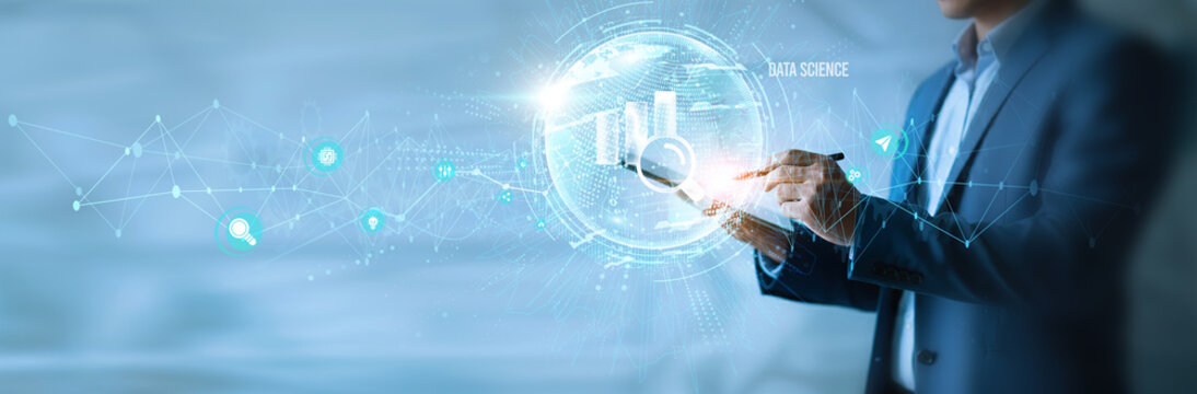 Businessman using tab data science icon with global network. Predictive analytics, machine learning, data visualization, big data insights, AI integration, business intelligence.