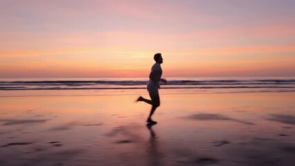 Running on Beach at Sunrise in Slow Motion