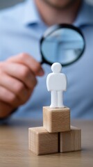 Professional evaluating candidate figure with magnifying glass for human resources recruitment and labor analysis. Talent selection, job trends, personnel hiring strategies.