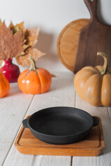 Autumn Kitchen Decor with Cast Iron Skillet and Pumpkins