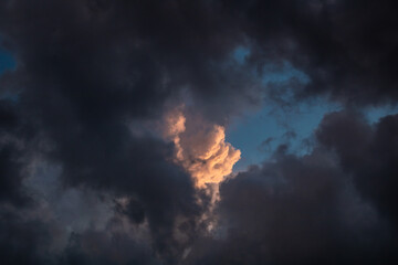 Dramatic sky with dark stormy clouds background 