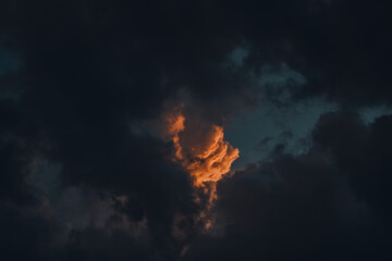 Dramatic sky with dark stormy clouds background 