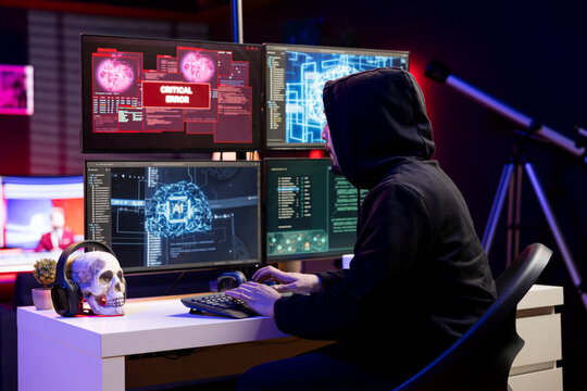 Hacker seeing critical error warning while stealing data from enterprise networks using AI software. Evil man targeting company servers getting cyber attack rejected alert popup on monitor