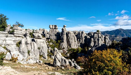 Rocky landscape with unusual formations under a clear sky