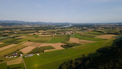 Naklejka premium Perfect view. Green fields Burgruine Stauf. Ob der Donau, Austria. Aerial drone view. Castle