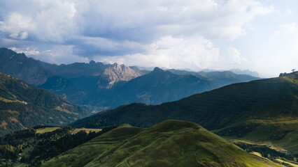 Fototapeta premium Excelente toma desde drone de las dolomitas en Italia. Majestic mountain scenery within spring time - blooming mountain slopes Seceda, Dolomites, Italy, hiking trail