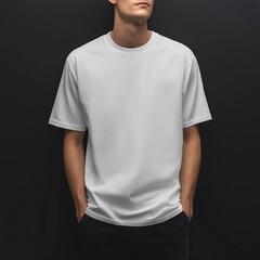 man wearing a plain oversized white tshirt standing in a neutral pose dark background mockup style front view no logos or designs on the shirt