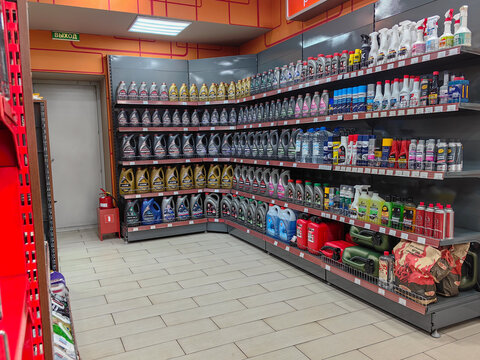 Store shelves stocked with motor oil and other automotive fluids. Lukoil. Novokuznetsk. Russia. 2025. 