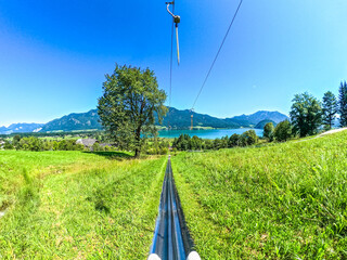 Wolfgangsee Sommerrodelbahn, summer toboggan run with mountain views in Austria | Wolfgangsee Sommerrodelbahn, Sommerrodelbahn mit Bergblick in Österreich