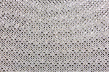 Gray perforated surface texture, abstract geometric pattern for modern background and design