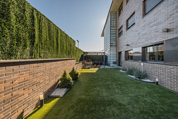 Panoramic terrace with   top-quality deep green artificial grass