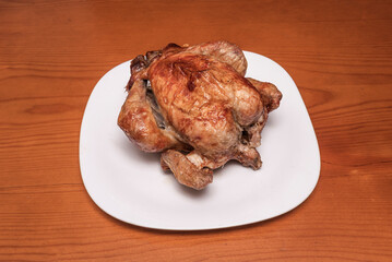 French-style roasted chicken with herb butter, served with skinny fries and béarnaise sauce on the side