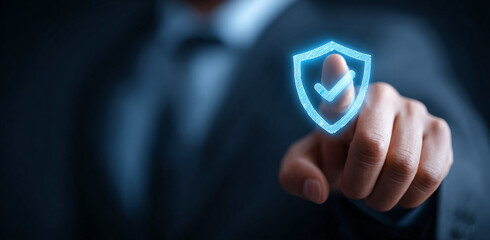 Blue shield illustration hovers over finger, protecting secure data. For digital security, branding, and technology concepts.