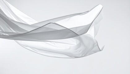 Flowing White Fabric Against A Neutral Background Capturing Movement