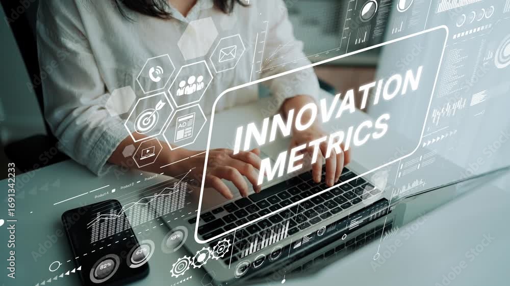 Poster business professional analyzing innovation metrics with digital interface overlay on laptop in moder