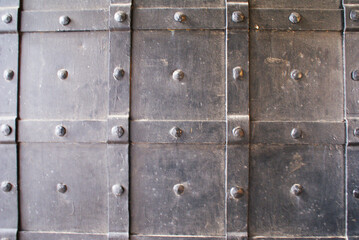 Fototapeta premium Beautiful historical iron gate in ancient fortress, doors.