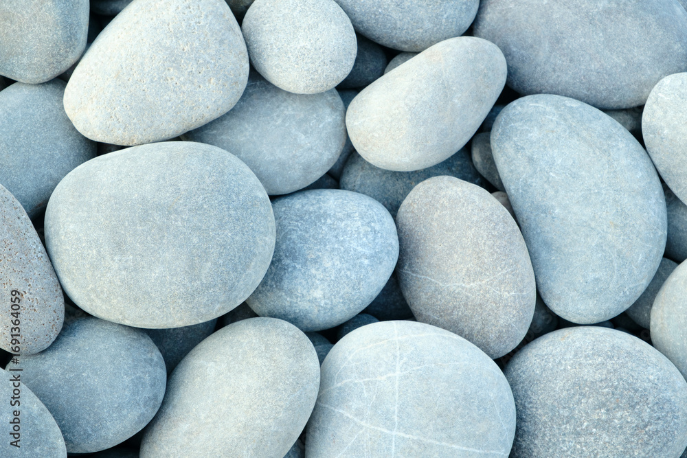 Poster pebbles stones on seashore as texture background for design of web banner template page. many stones