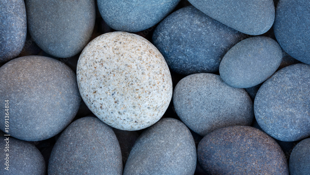Poster pebbles stones on seashore as texture background for design of web banner template page. many stones