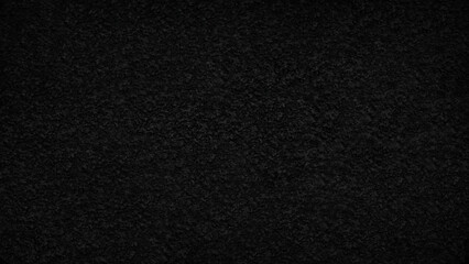 Black wall with a rough, grainy texture as a textured background for a web banner template page design.