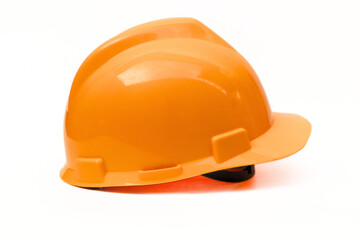 Fototapeta premium Yellow helmet for construction project on white background