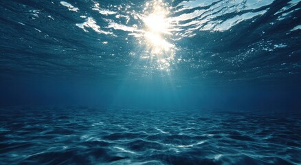 Underwater sunbeam view.  Deep blue ocean floor
