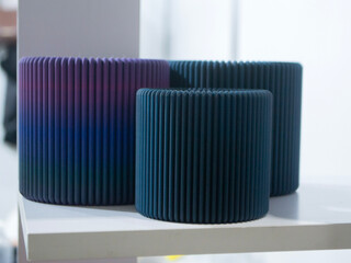 Object printed on 3D printer close up. Model printed on 3D printer from molten plastic. Vase printed on 3D printer from molten plastic of black color. 3D printing technology. Additive FDM technologies