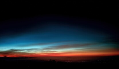 Sunrise over city skyline