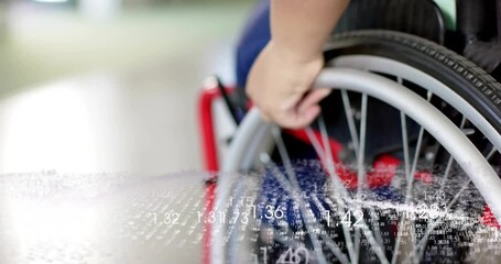 Woman pushing wheelchair rim and propelling for rehab while numeric data overlay drifting - Powered by Adobe