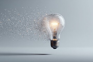 Illuminated lightbulb, radiating particles