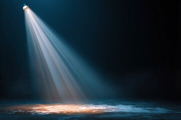 Stage spotlight illuminates dark stage floor