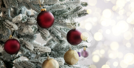 Christmas tree with stylish decorations in room. Closeup