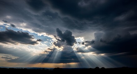 Dramatic Skies Sun Rays Pierce Through Storm Clouds Over a Dark Landscape