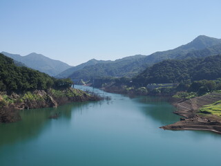 Gunma, Japan - September 7, 2025: Appeared due to drought, submerged disused railroad tracks,...