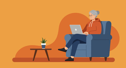 Content senior woman uses a laptop comfortably in her armchair at home, symbolizing modern connectivity, independent living, and digital engagement for the elderly.