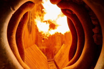 Intense combustion within a steam boiler furnace at a thermal power plant showcasing heat exchange...