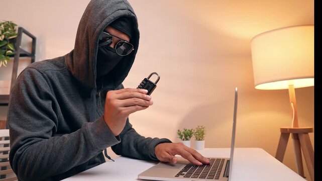 A hacker examines a combination lock, symbolizing the act of cracking security codes. The scene highlights cyber intrusion, password vulnerability, and the challenge of protecting digital information.