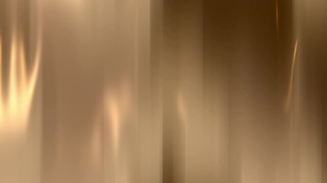 Golden brown gradient background animation. This seamless loop features a subtle, elegant design with smooth, flowing motion. Perfect for luxury or corporate projects.