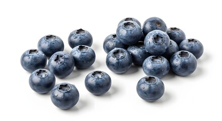 A scattering of fresh, ripe blueberries on a white background, showcasing their deep blue hue and slight bloom