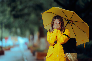 Unhappy Upset Woman Crying in a rainy Day. Sad unhappy girl covering her face suffering from...