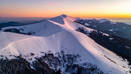 cinematic drone shot of a serene, snowy mountain range at sunset, 