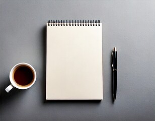 Blank notebook and coffee cup with pen on gray background white background 