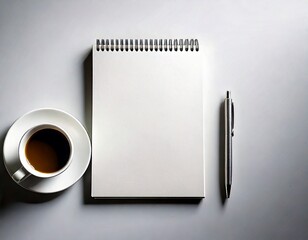  Blank notebook and coffee cup with pen on gray background white background 