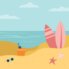 Beach scene with surfboards and toys.